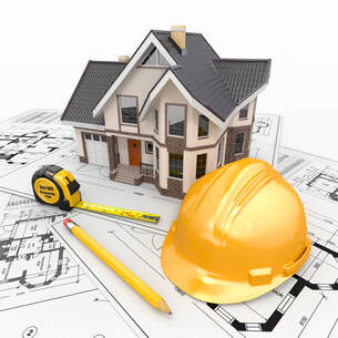 Image of a mocked home sitting on blue prints with a tape measure, a pencil and a hard hat.